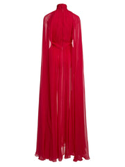 Red evening gown with a cape on a white background