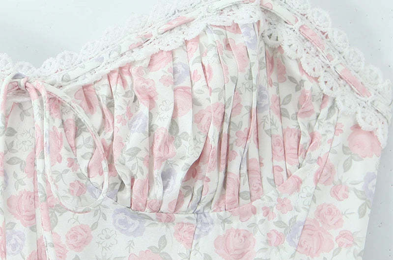 Detailed view of the ruched sweetheart neckline on a midi dress