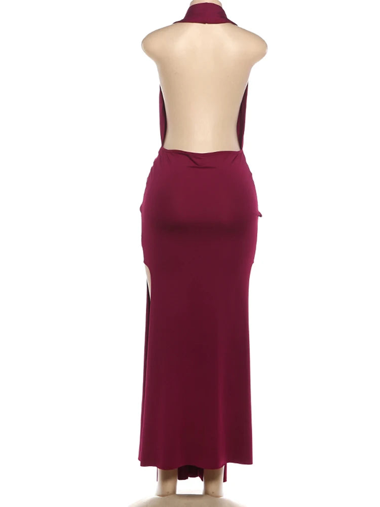 Maroon evening gown on a mannequin with a white background