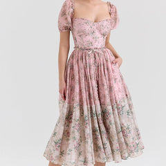 Pink floral dress on a white background