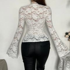 Women's lace top with a bandage design and long sleeves.