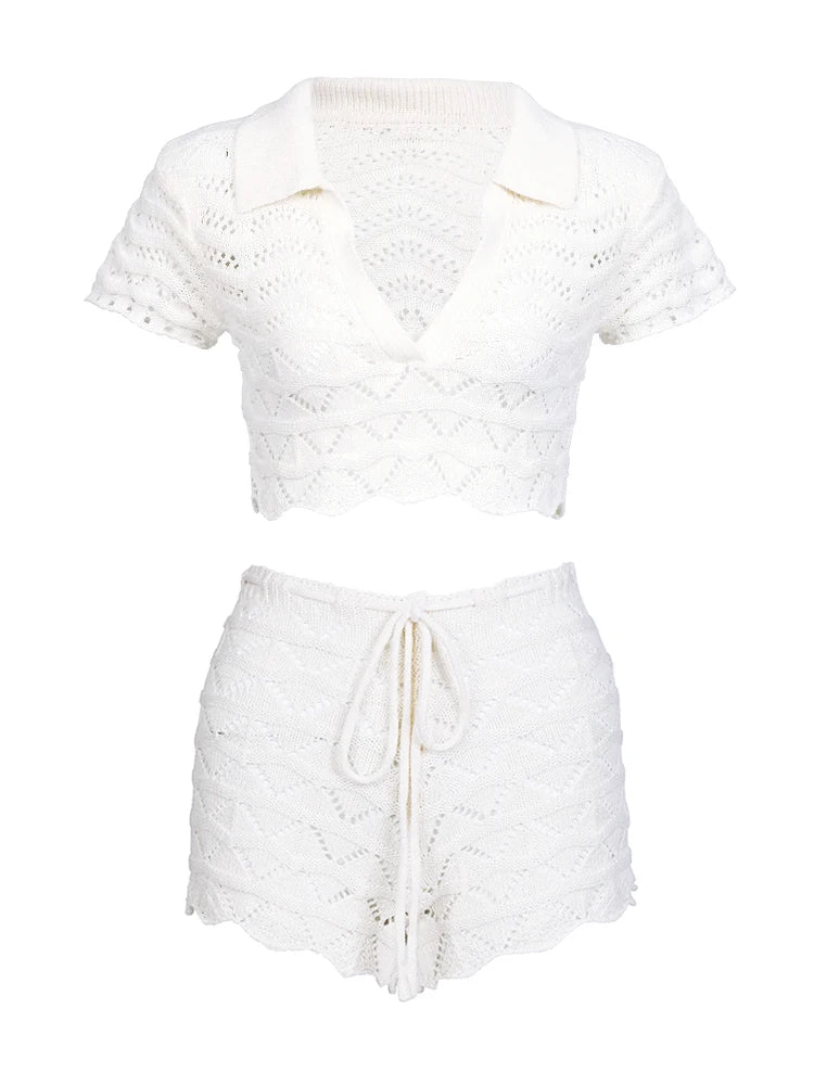 White lace top and skirt set on a white background