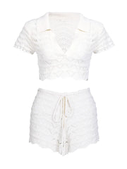 White lace top and skirt set on a white background