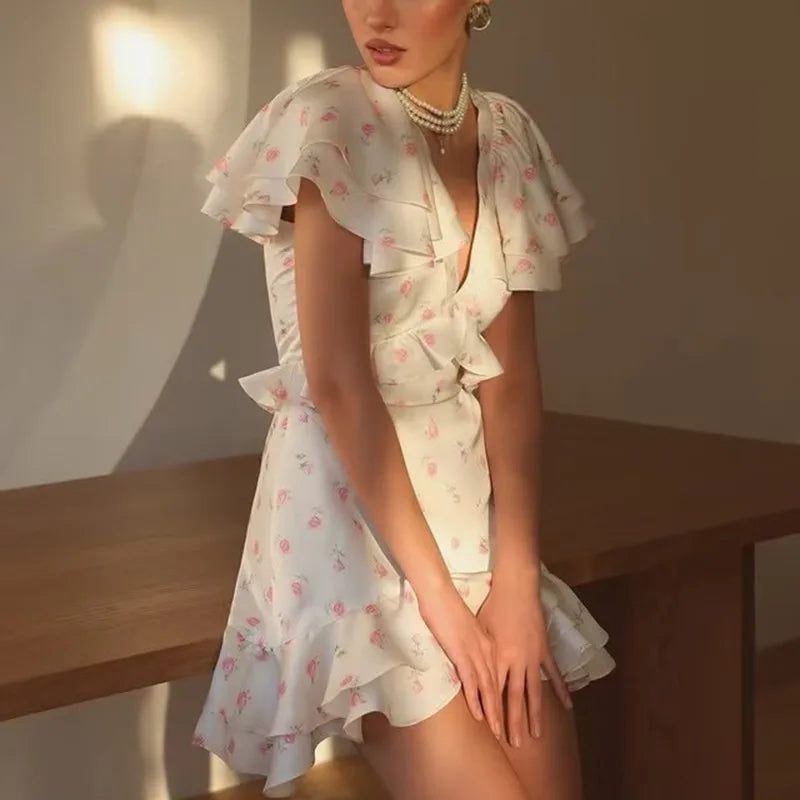Close-up of a floral ruffled V-neck mini dress neckline