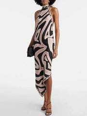 Halter neck abstract print maxi dress with asymmetrical hem