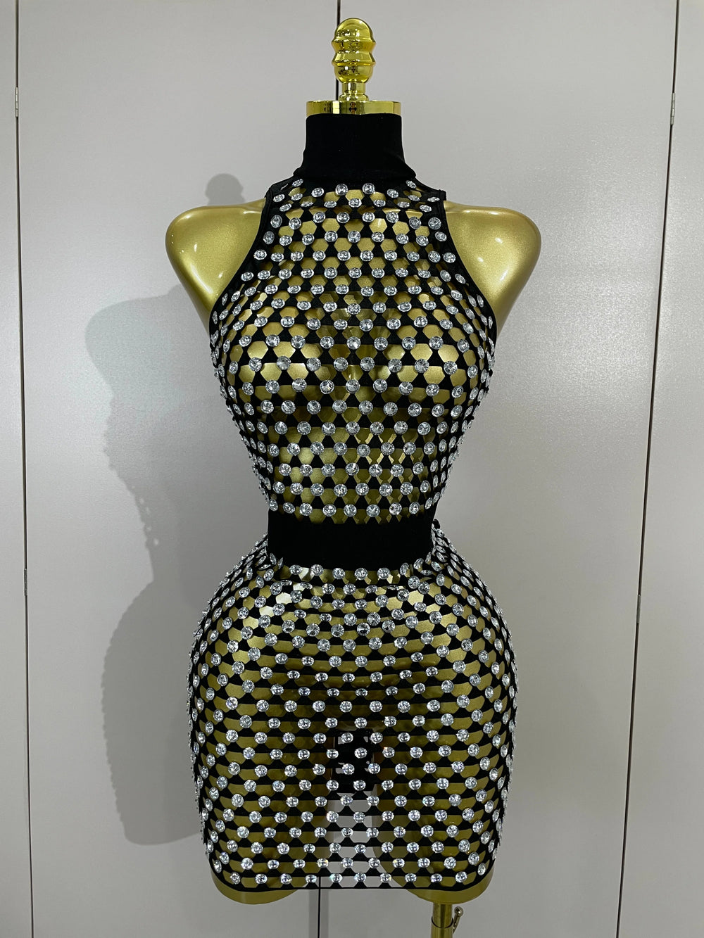 Sparkling mesh mini dress on mannequin