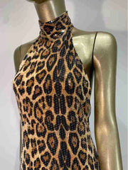 Leopard print dress on a mannequin against a plain background