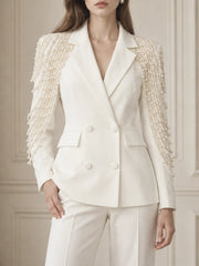 White double-breasted blazer with pearl beaded shoulder embellishments