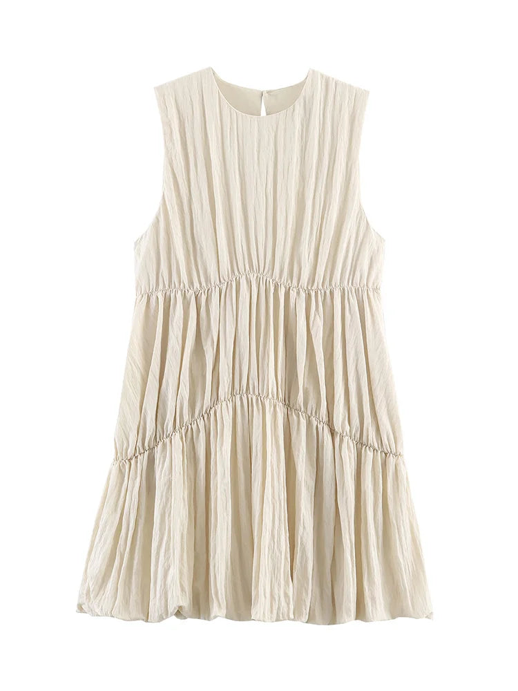 Beige sleeveless dress with ruffled layers on a white background