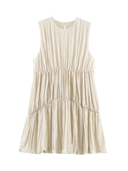 Beige sleeveless dress with ruffled layers on a white background