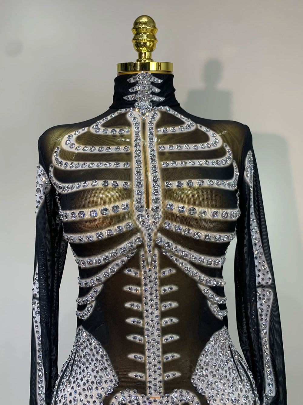 Skeleton rhinestone mesh jumpsuit neckline detail