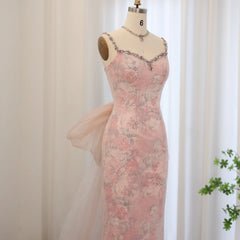 Mannequin displaying the pink velvet mermaid evening gown, showcasing its flattering silhouette and elegant train .Golden Atelier 3