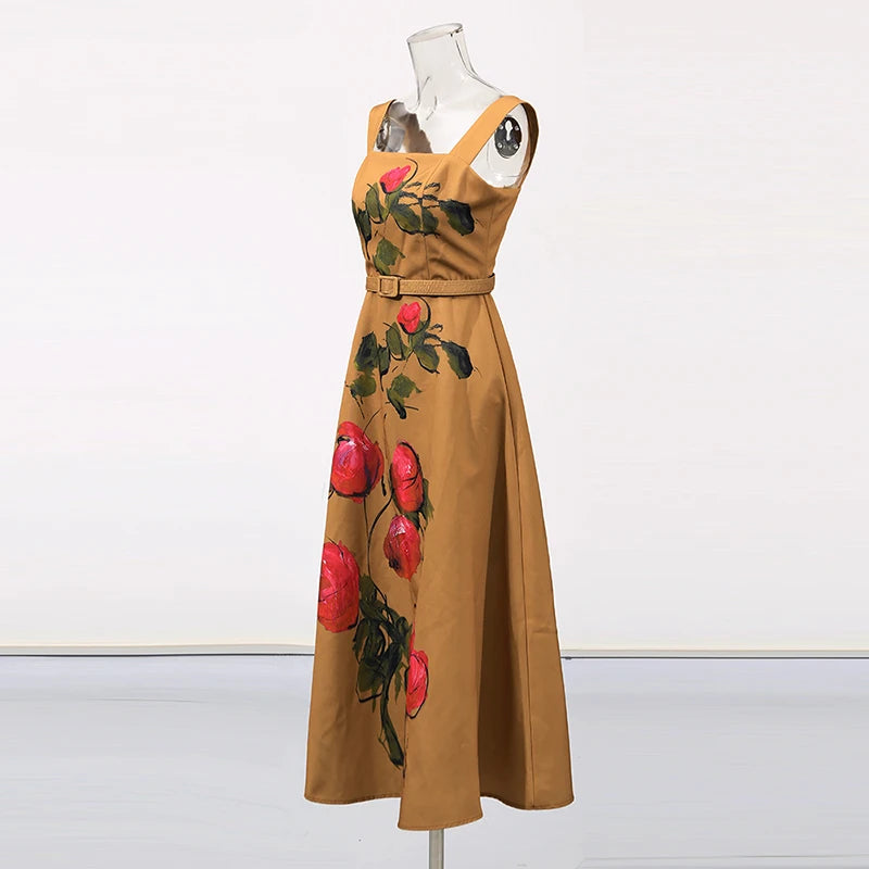 Brown dress with floral patterns on a mannequin against a white background