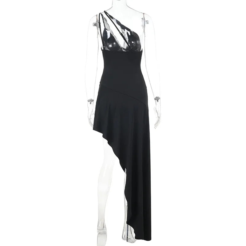 Black evening gown with sheer panels on a mannequin against a white background