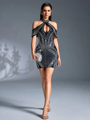 Full length view of a person wearing a beaded halter neck mini dress