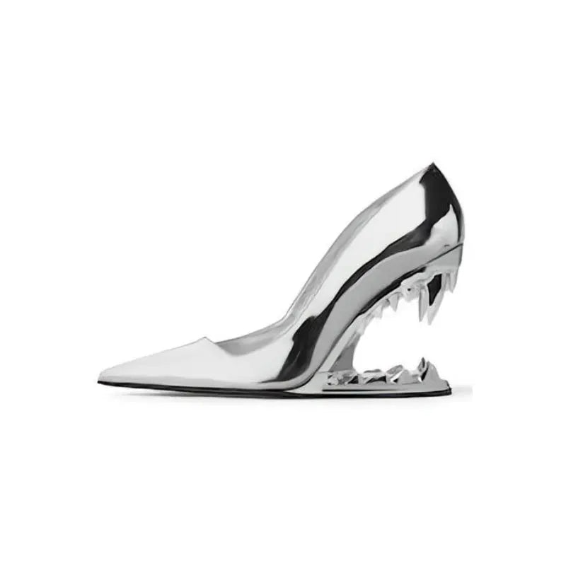 Silver high-heeled shoe on a white background