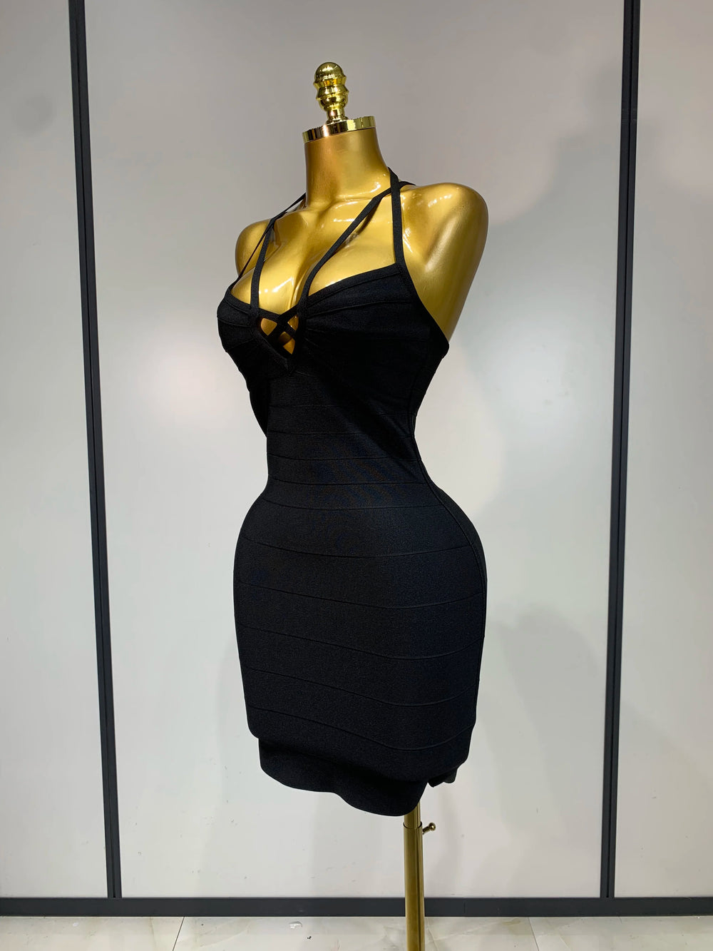 Black crisscross halter mini dress side view
