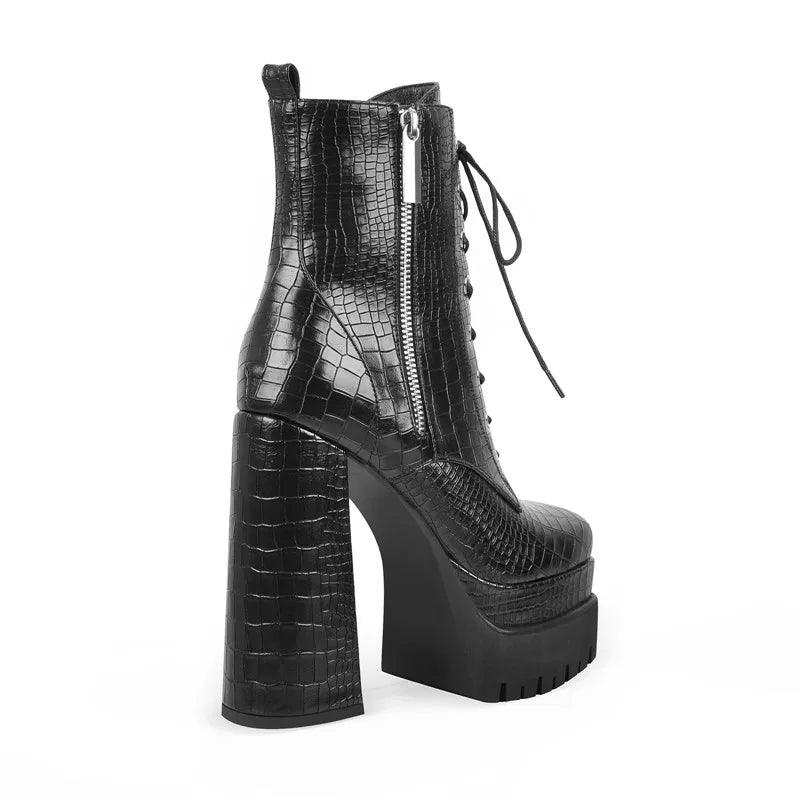 Black chunky platform lace-up ankle boot with a textured finish and side zipper.
