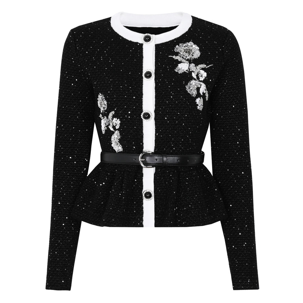 Black sequined embroidered peplum knit cardigan with a white trim and belt.
