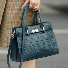 A woman carrying a stylish Black leather tote bag, showcasing its versatility and everyday use.