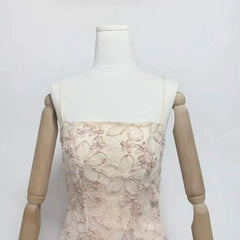 Close-up of floral embroidery on tulle dress