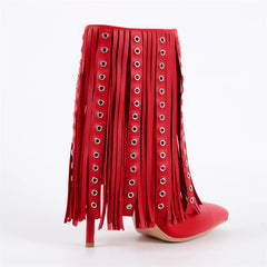 Side view of red pointed toe ankle boots with fringe detail