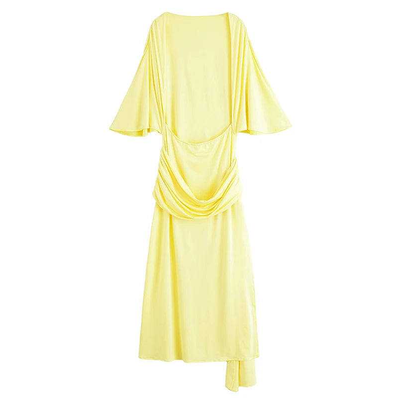 Yellow dress with draped design on a white background