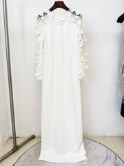White three-dimensional flower mesh sleeve maxi dress, detail on hanger
