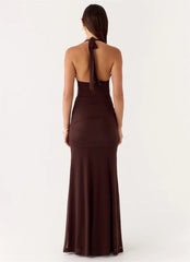 Brown halter neck dress on a white background