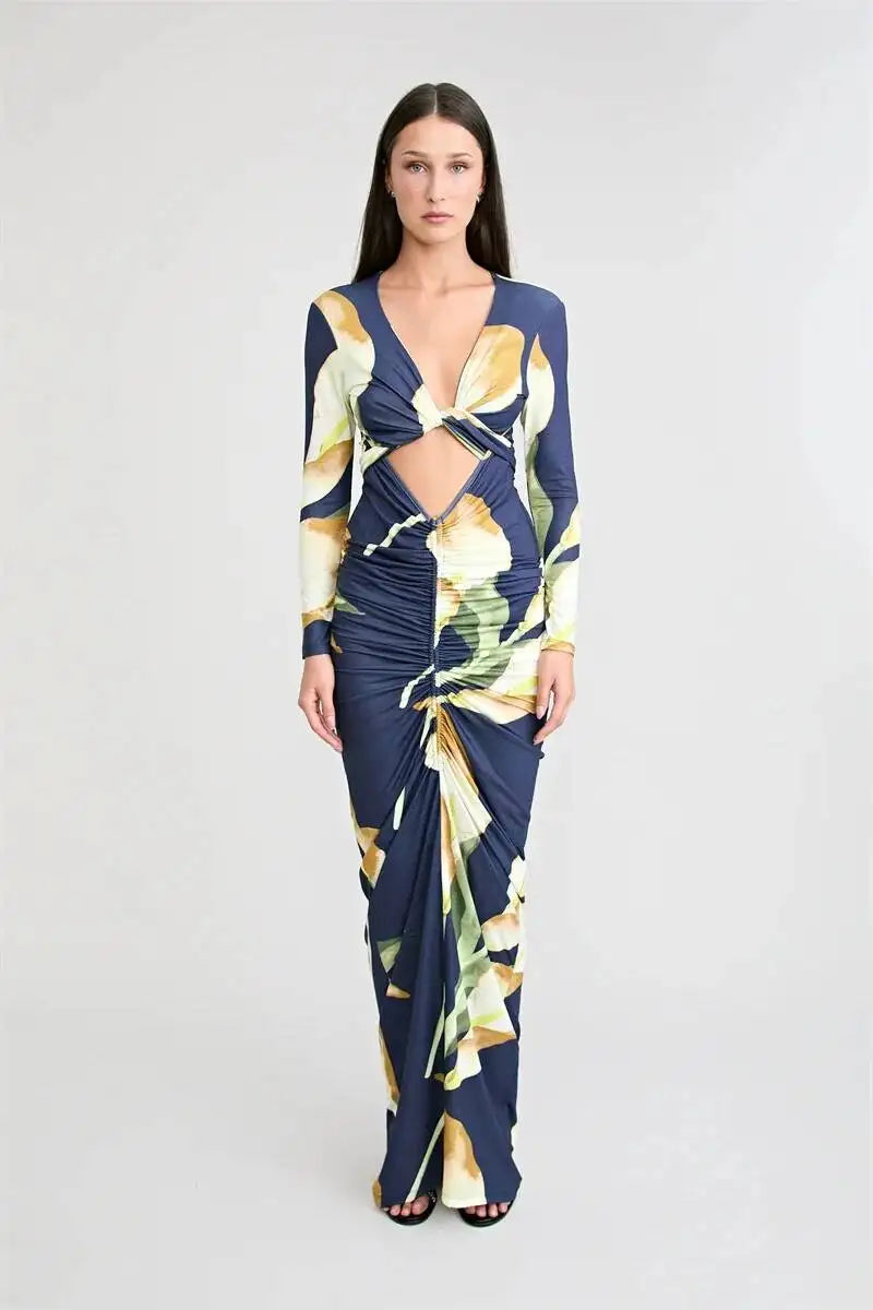 Full view of a model wearing a floral print off-shoulder maxi dress