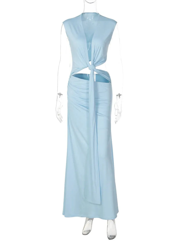Light blue dress with cut-out design on a white background