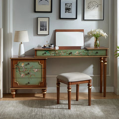 Blue-green vanity table styled in a soft-lit room with artwork and natural decor

