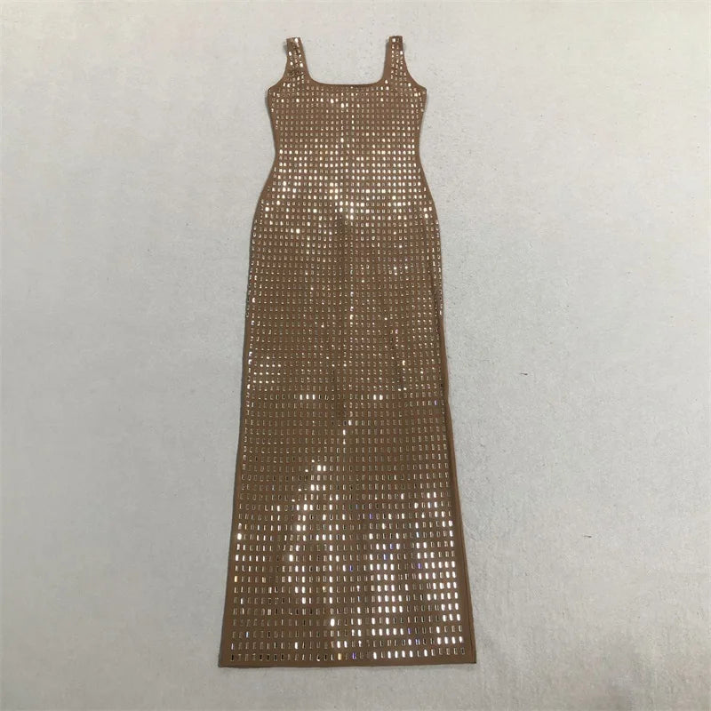 Flat lay of a floor-length dress adorned with crystals