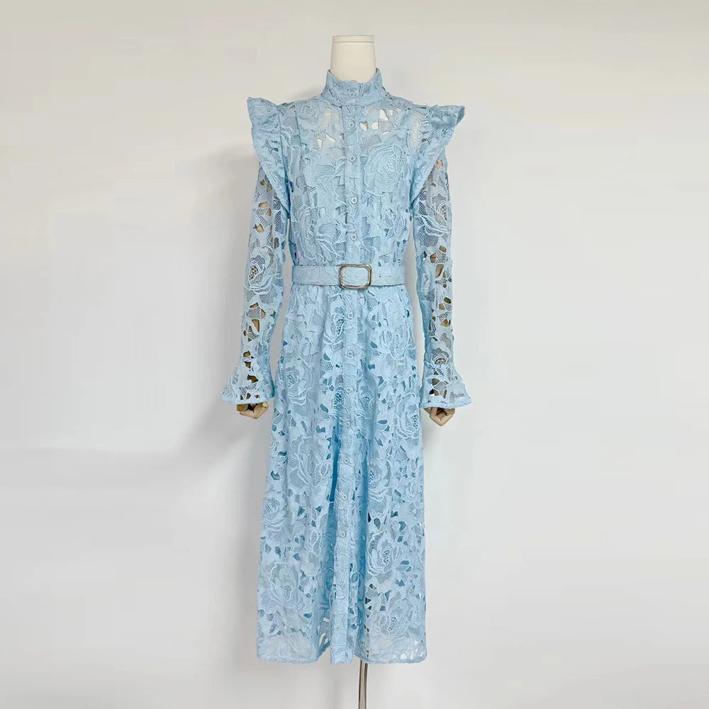 Light blue lace dress on a mannequin against a white background