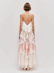 Woman wearing a lace dress with a white background
