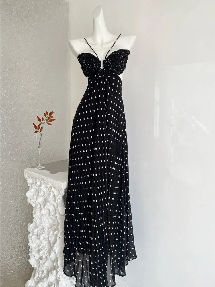 Polka dot cutout maxi dress on mannequin