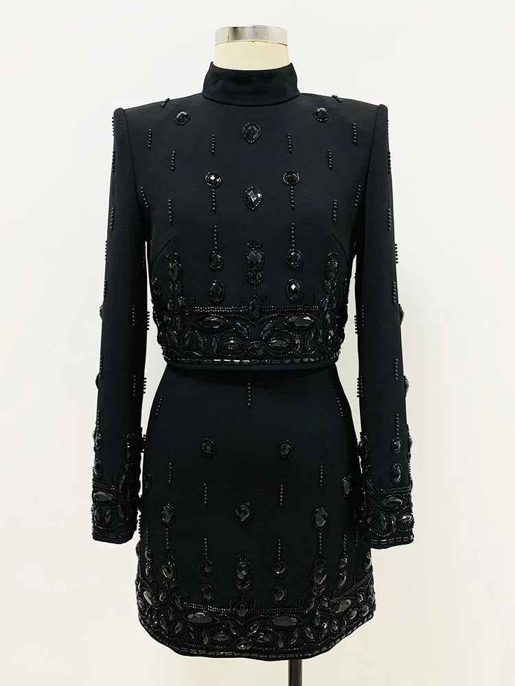 Black embellished stand collar cropped jacket on mannequin