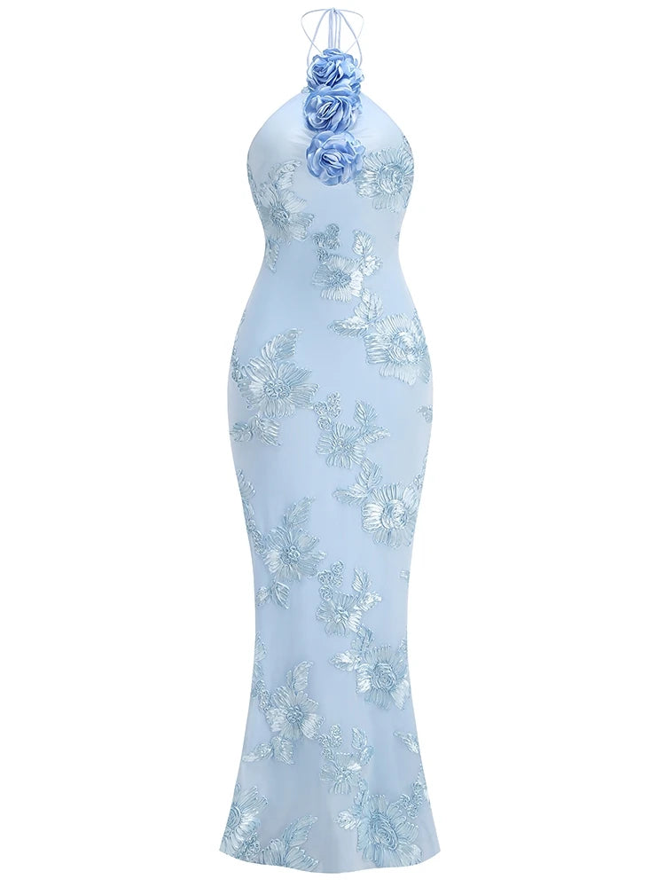 Light blue evening gown with floral embellishments on a white background
