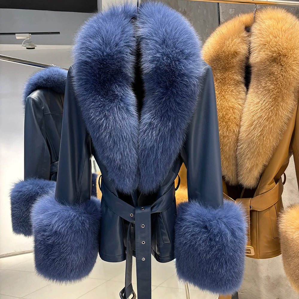 Blue fur-trimmed leather coat on a rack with another coat in the background.