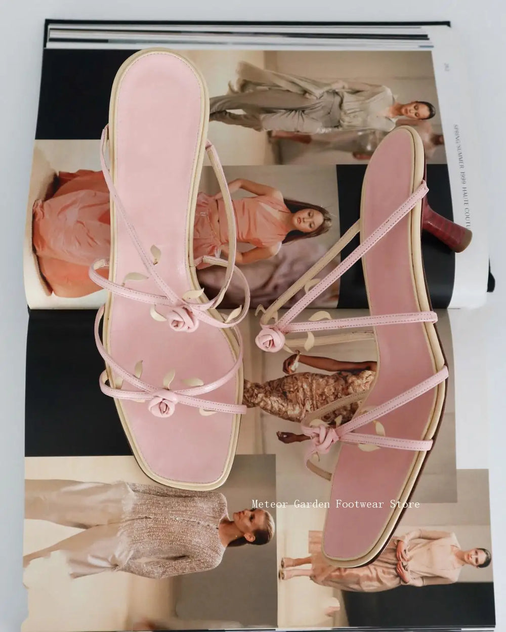 Pink rose square toe low heel sandals styled on a magazine spread