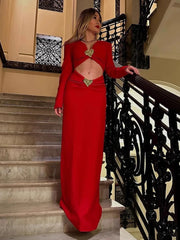 Slim fit red evening dress with sculpted waist and accent detail
