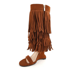 Brown fringe wedge heel boots