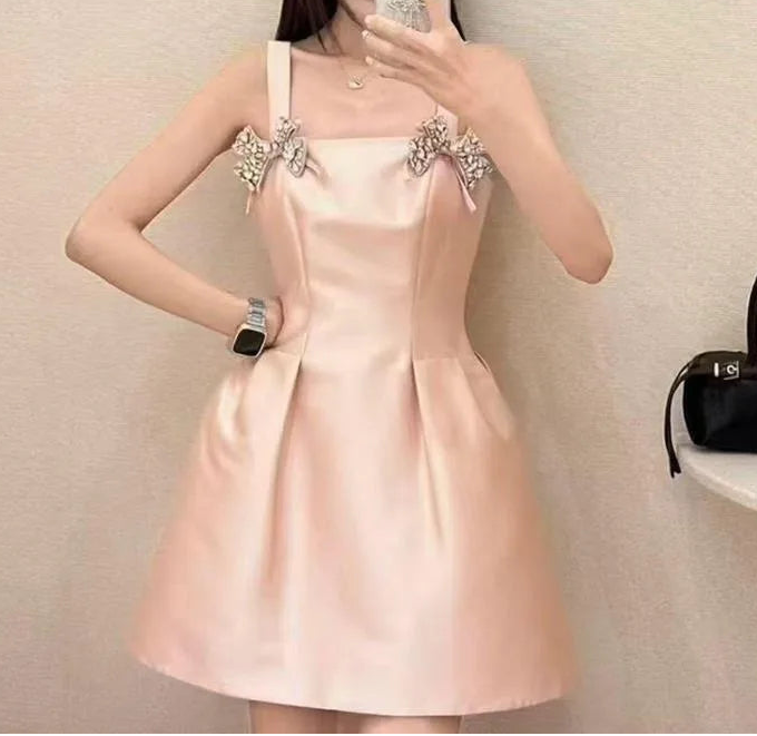 Diamond bow embellished strap square neck mini dress detail