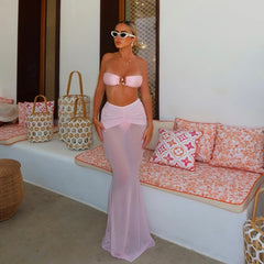 Pink bikini top and sheer maxi skirt