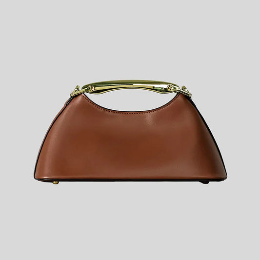 Brown trapezoid top handle bag with a gold metal bar handle