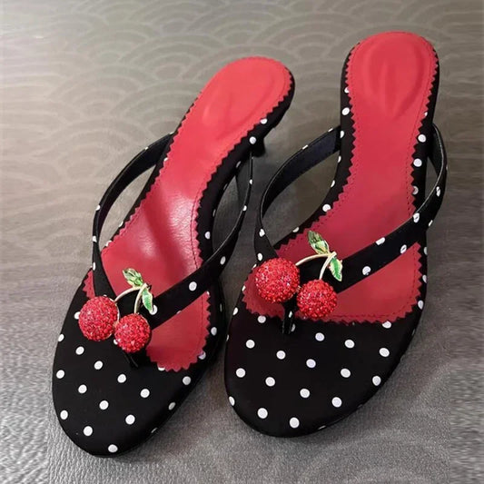 Polka dot kitten heel flip flops with cherry embellishment
