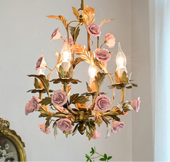 Decorative chandelier with floral design on a light gray background