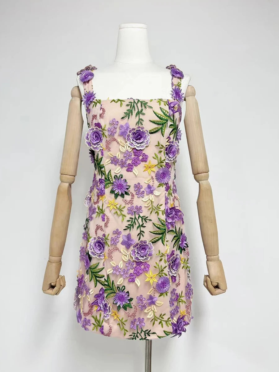 Floral dress on a mannequin against a white background