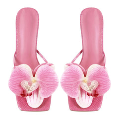 Pink square-toe flower mules for women with 10cm thin heels.