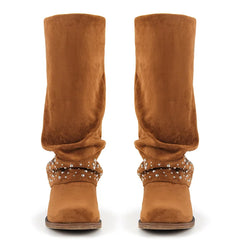 Front view of two brown faux suede boots with studded fold-over cuffs.